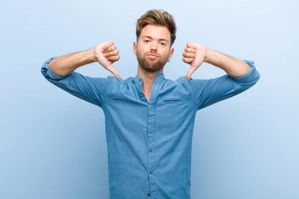 Young Businessman Looking Sad Disappointed Angry Showing Thumbs Disagreement Feeling — Stock Photo, Image