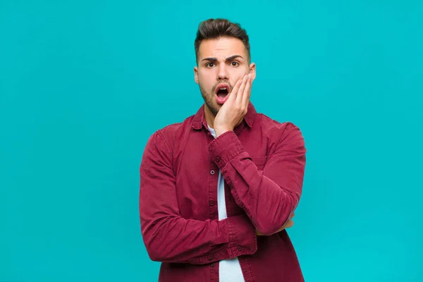 Young Hispanic Man Open Mouthed Shock Disbelief Hand Cheek Arm — Stock Photo, Image