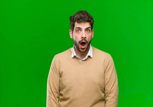 Young Businessman Feeling Terrified Shocked Mouth Wide Open Surprise Green — Stock Photo, Image