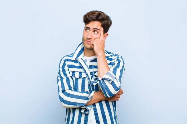 Young Handsome Man Concentrated Look Wondering Doubtful Expression Looking Side — Stock Photo, Image