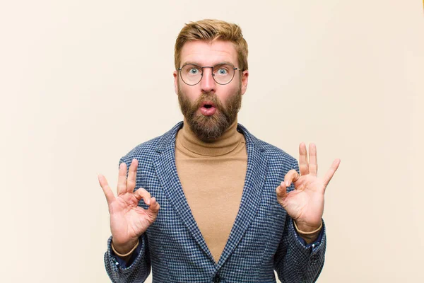 Young Blonde Businessman Feeling Shocked Amazed Surprised Showing Approval Making — Stock Photo, Image