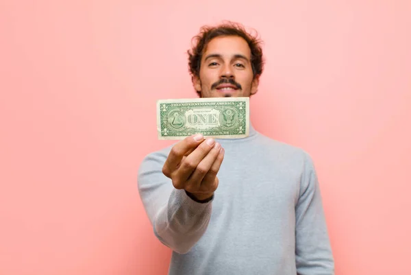 Joven Hombre Guapo Con Billetes Dólar Contra Pared Plana Rosa — Foto de Stock