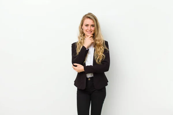 Young Blonde Woman Looking Happy Smiling Hand Chin Wondering Asking — Stock Photo, Image