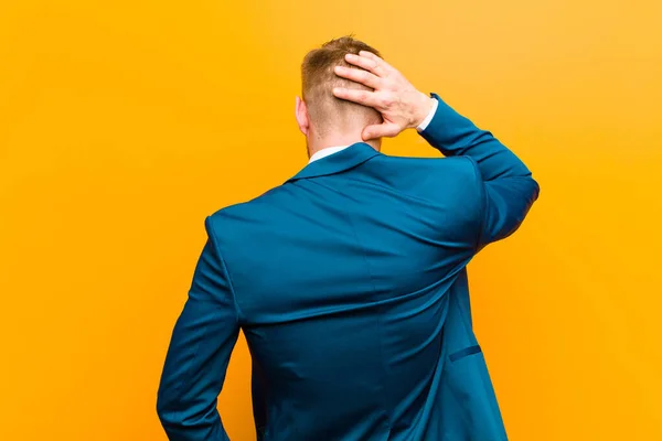 Young Red Head Businessman Thinking Doubting Scratching Head Feeling Puzzled — Stock Photo, Image