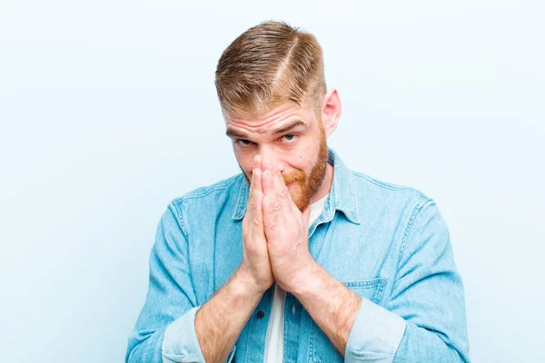 Young Red Head Man Feeling Worried Hopeful Religious Praying Faithfully — Stock Photo, Image
