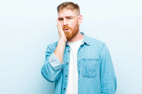 Young Red Head Man Feeling Shocked Astonished Holding Face Hand — Stock Photo, Image