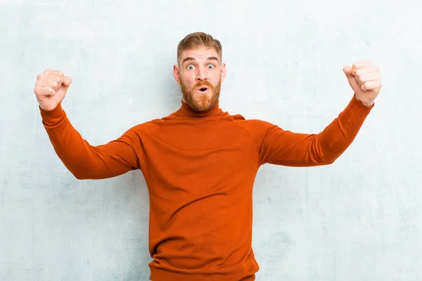 Young Red Head Man Wearing Turtle Neck Celebrating Unbelievable Success — Stock Photo, Image