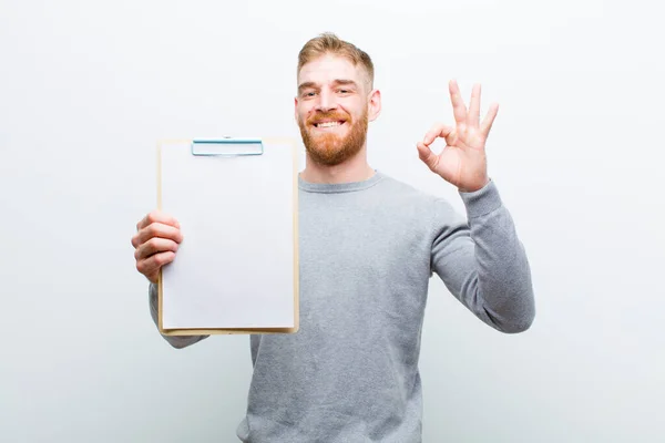 Young Red Head Man Showing Document White Background — Stock Photo, Image