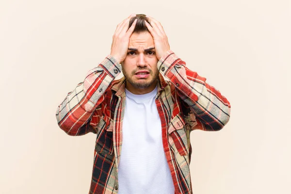 Young Hispanic Man Feeling Horrified Shocked Raising Hands Head Panicking — ストック写真