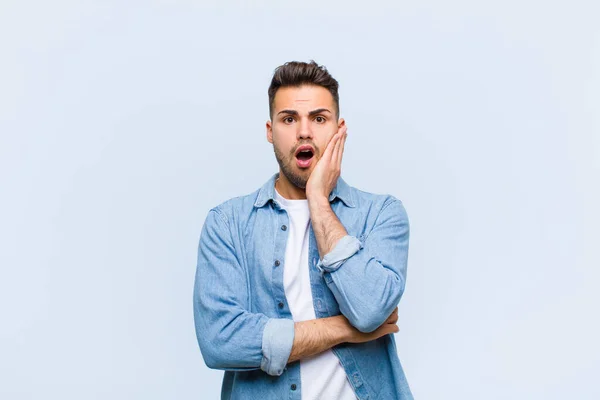 Young Hispanic Man Open Mouthed Shock Disbelief Hand Cheek Arm — Stock Photo, Image