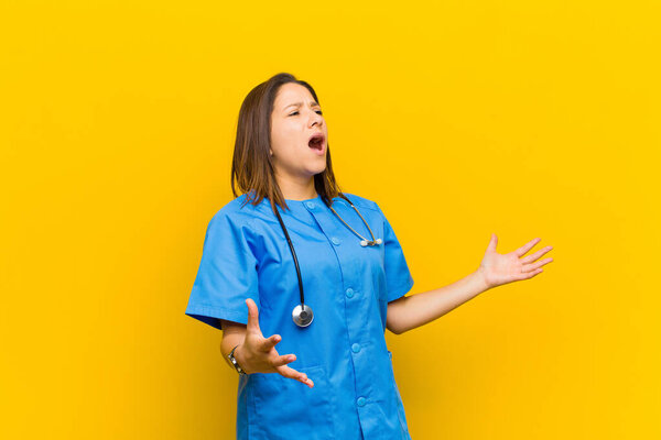 performing opera or singing at a concert or show, feeling romantic, artistic and passionate isolated against yellow wall