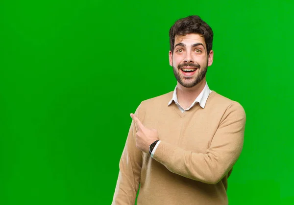 Young Businessman Looking Excited Surprised Pointing Side Upwards Copy Space — Stock Photo, Image