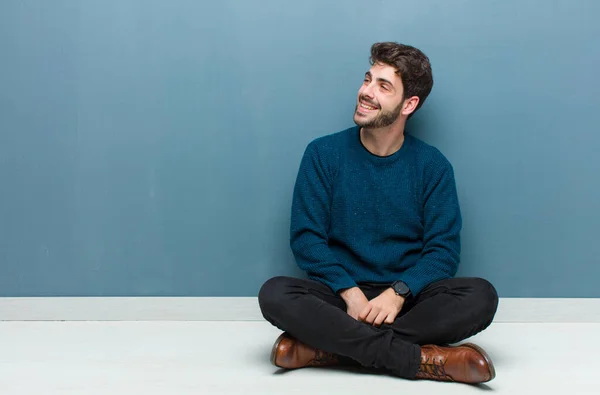 Young Handsome Man Sitting Floor Thinking Doubting Scratching Head Feeling — Stock Photo, Image