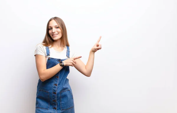 Young Pretty Woman Smiling Happily Pointing Side Upwards Both Hands — Stock Photo, Image