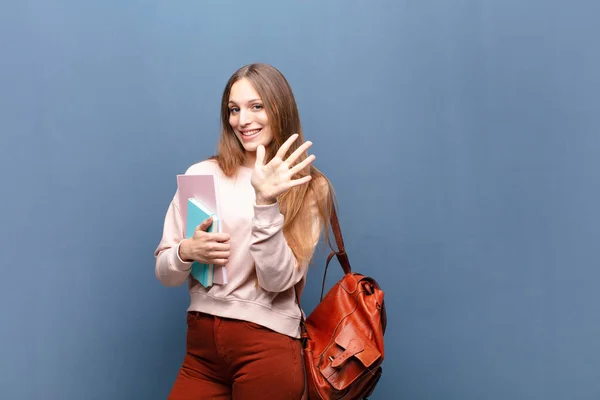 Young Pretty Student Woman Books Bag Blue Wall Copy Space — Stock Photo, Image