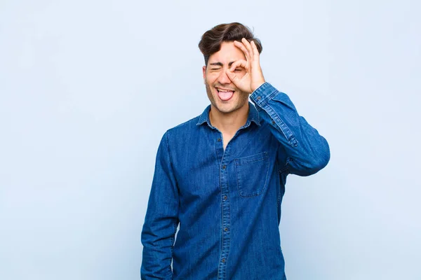 Young Handsome Man Smiling Happily Funny Face Joking Looking Peephole — Stock Photo, Image