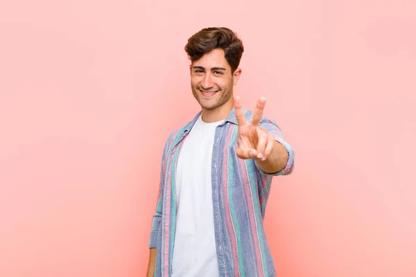 Young Handsome Man Smiling Looking Happy Carefree Positive Gesturing Victory — Stock Photo, Image