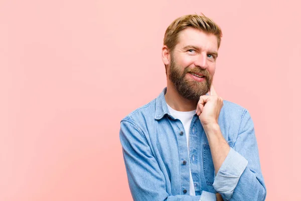 Young Blonde Adult Man Smiling Happily Daydreaming Doubting Looking Side — Stock Photo, Image