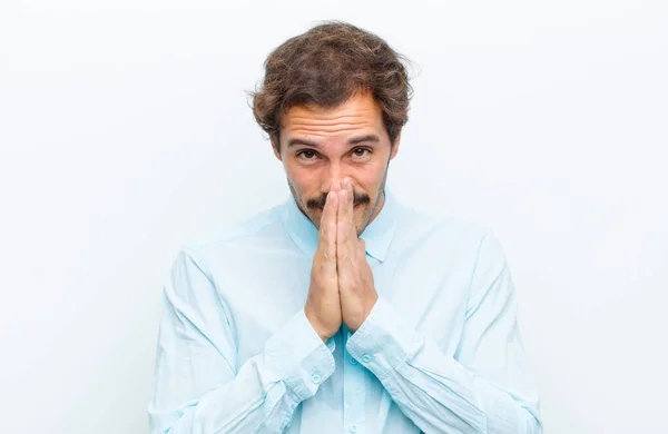 Young Handsome Man Feeling Worried Hopeful Religious Praying Faithfully Palms — Stock Photo, Image