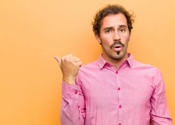 Young Handsome Man Looking Astonished Disbelief Pointing Object Side Saying — Stock Photo, Image