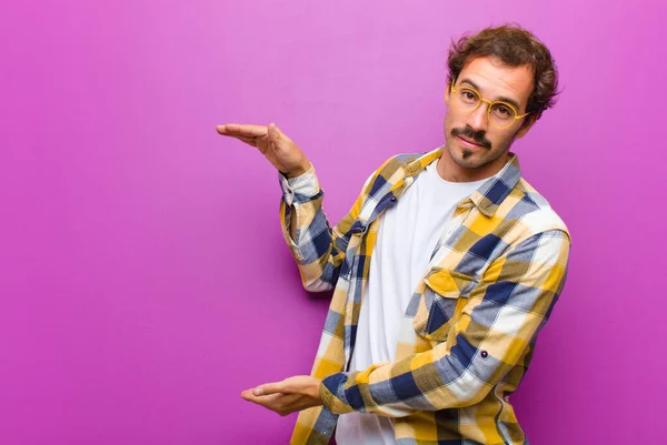 Young Handsome Man Holding Object Both Hands Side Copy Space — ストック写真