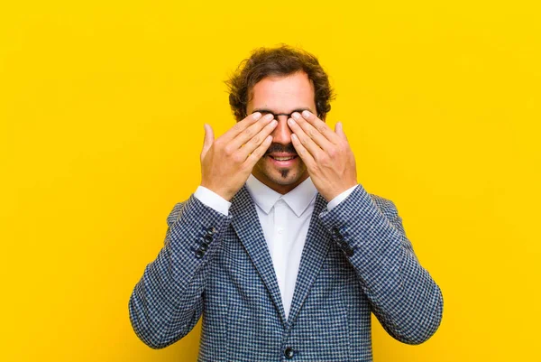 Young Handsome Man Smiling Feeling Happy Covering Eyes Both Hands — Stock Photo, Image