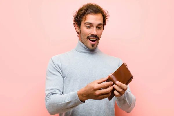 Young Handsome Man Wallet Pink Flat Wall — Stock Photo, Image