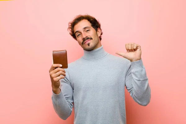 Young Handsome Man Wallet Pink Flat Wall — Stock Photo, Image