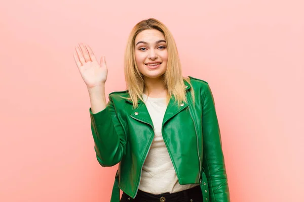 Young Pretty Blonde Woman Smiling Happily Cheerfully Waving Hand Welcoming — Stock Photo, Image