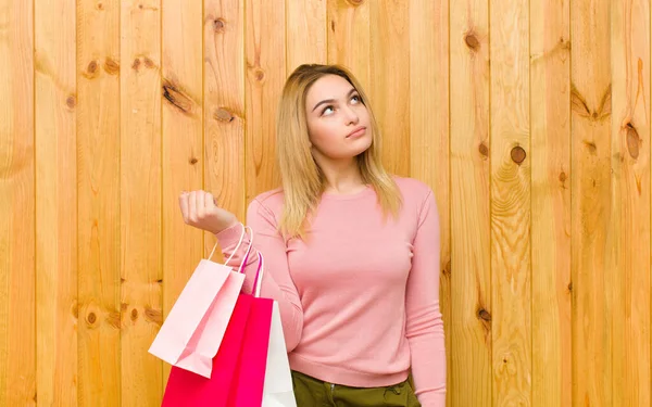 Young Pretty Blonde Woman Shopping Bags Wood Wall — Stock Photo, Image