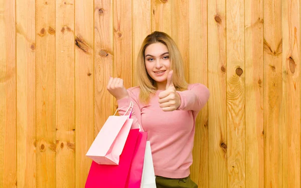 Young Pretty Blonde Woman Shopping Bags Wood Wall — Stock Photo, Image