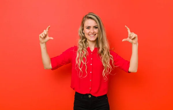 Young Blonde Woman Framing Outlining Own Smile Both Hands Looking — Stockfoto