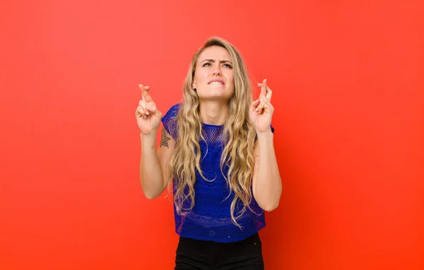 Young Blonde Woman Crossing Fingers Anxiously Hoping Good Luck Worried — Stockfoto