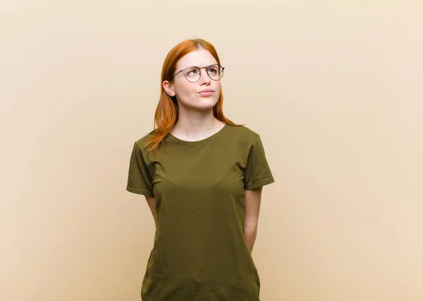 Young Red Head Pretty Woman Looking Puzzled Confused Wondering Trying — Stockfoto