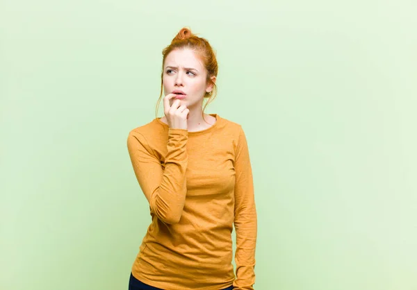 Young Pretty Red Head Woman Surprised Nervous Worried Frightened Look — Stock Photo, Image