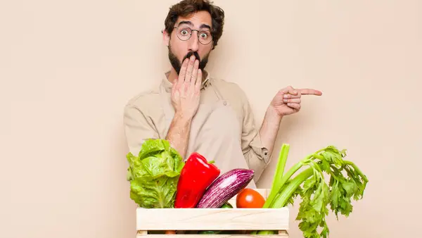 Green Grocery Man Feeling Happy Shocked Surprised Covering Mouth Hand — Stock Photo, Image