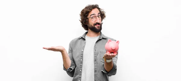 Young Crazy Cool Man Holding Piggy Bank White Wall — 스톡 사진