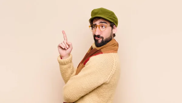 Young Cool Bearded Man Feeling Genius Holding Finger Proudly Air — Stock Photo, Image