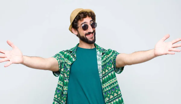 Young Tourist Man Smiling Cheerfully Giving Warm Friendly Loving Welcome — Stock Photo, Image