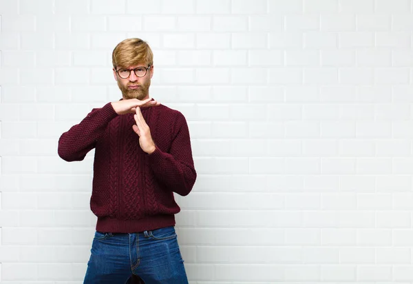 Young Blonde Man Looking Serious Stern Angry Displeased Making Time — Stock Photo, Image