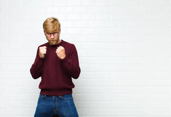 Young Blonde Man Looking Confident Angry Strong Aggressive Fists Ready — Stock Photo, Image