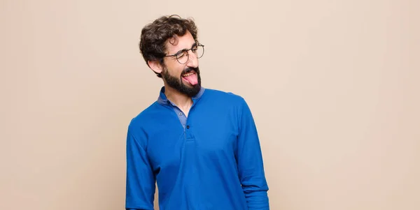 Young Handsome Man Cheerful Carefree Rebellious Attitude Joking Sticking Tongue — Stock Photo, Image