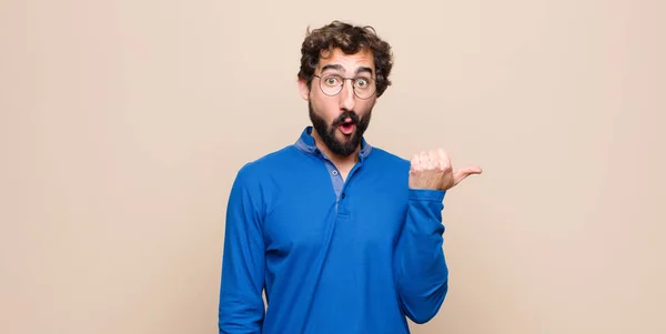 Young Handsome Man Looking Astonished Disbelief Pointing Object Side Saying — Stock Photo, Image