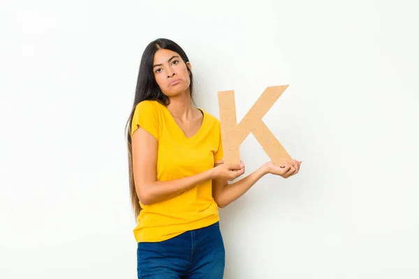 Young Latin Pretty Woman Sad Depressed Unhappy Holding Letter Alphabet — Stock Photo, Image