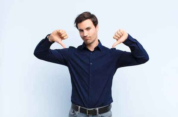 Young Handsome Man Looking Sad Disappointed Angry Showing Thumbs Disagreement — Stock Photo, Image