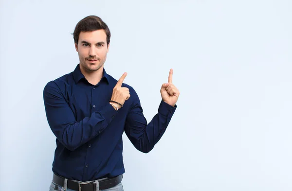 Man Smiling Happily Pointing Side Upwards Both Hands Showing Object — Stock Photo, Image