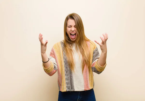 Young Blonde Woman Furiously Screaming Feeling Stressed Annoyed Hands Air — Stock Photo, Image