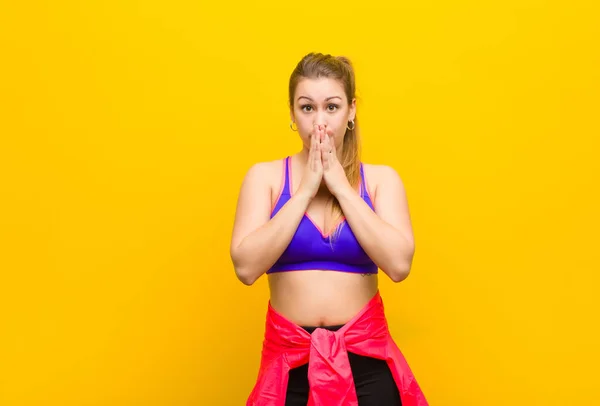 Young Blonde Woman Feeling Worried Upset Scared Covering Mouth Hands — Stock Photo, Image