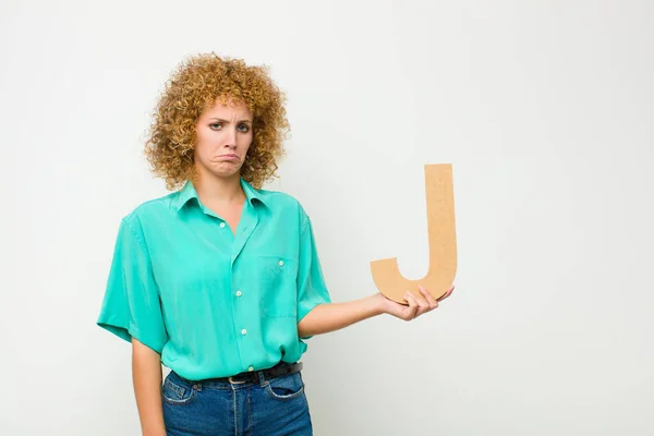 Young Pretty Afro Woman Sad Depressed Unhappy Holding Letter Alphabet — Stock Photo, Image