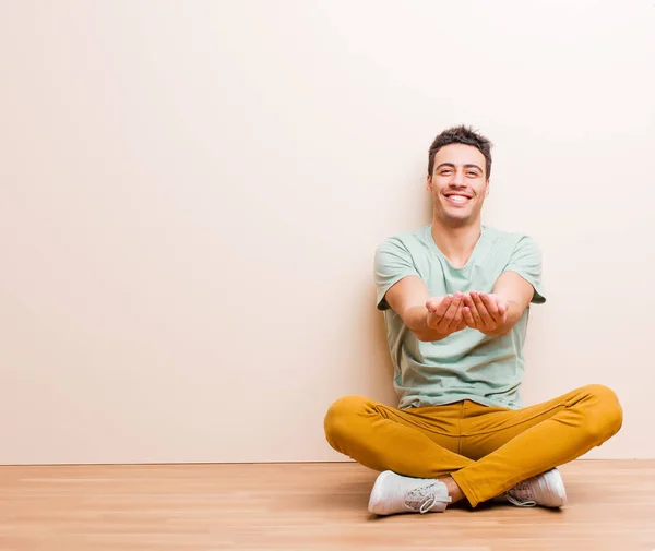 Young Arabian Man Smiling Happily Friendly Confident Positive Look Offering — Stock Photo, Image